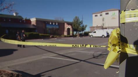 Two found dead with gunshot wounds at Holiday Inn in Parker