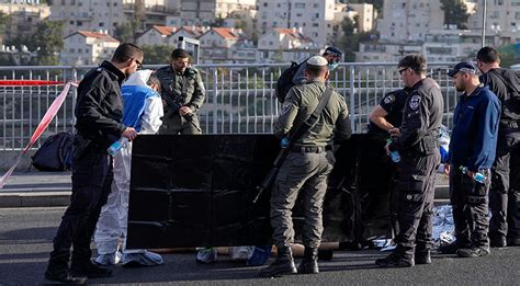 Two gunmen fire at people at a bus stop on the outskirts of Jerusalem, wounding seven before being killed