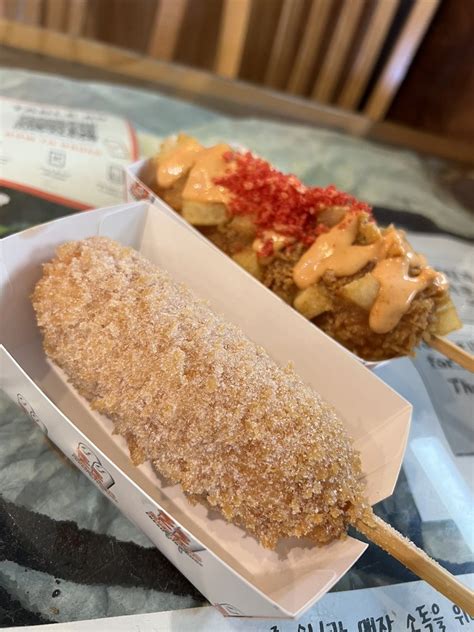 0.2 miles away from Two Hands Seoul Fresh Corn Dogs Sophia M. said "Fuku Omakase was my first omakase and was the best place to …. 