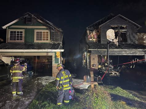 Two homes destroyed, firefighter burned in 2-alarm firework fire