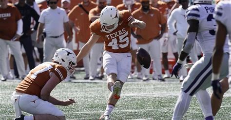 Two late FGs help No. 7 Texas beat 25th-ranked Kansas State 33-30 in OT