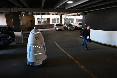 Two robots are patrolling downtown Denver parking garages. Are more coming?