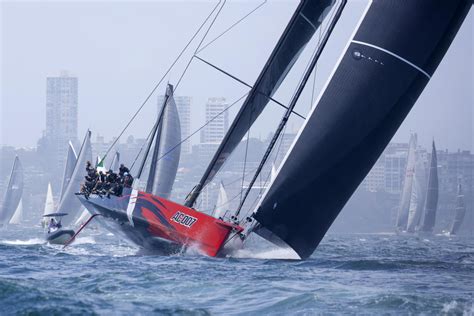Two super maxis continue to lead the Sydney to Hobart race as storms hit fleet