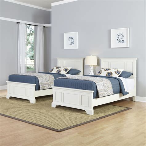 Two twin beds. Note that twin-size beds typically measure about 39 inches wide by 75 inches long (a twin XL, designed for taller people, measures 80 inches long). A full-size bed, or double bed, measures 54 inches wide by 75 inches long. A 4-foot by 6-foot or a 5-foot by 8-foot area rug fits the bottom two-thirds of the bed only. 