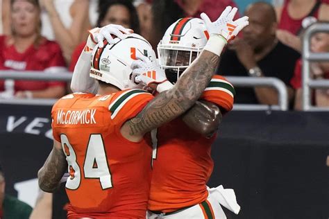 Tyler Van Dyke throws a TD on his first pass of the game, Miami beats Miami (OH) 38-3