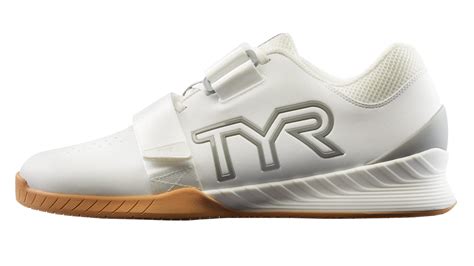 TYR L-1 Weightlifting Shoe now available for Pre-Order, $199.99, available Nov '22. A fairly slick black/gold limited edition... that unfortunately sports a big ole Squat U logo on the heel. A standard edition for mens and women's in their own colorway. . 