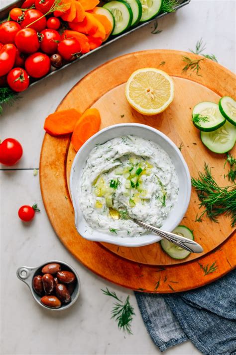 Tzatziki sauce vegan. In a high-speed blender, process all ingredients, except cucumber until smooth. Give the grated cucumber a squeeze to remove excess water. Stir into blended mixture. Voila! $2.99. Cashew Tzatziki ... 