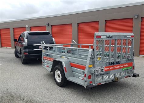 I just used the U-Haul 6x12 dual-axle trailer to transport a 1972 MG Midget from Naples to Orlando, Florida. ... (the 6x12 Utility with Ramp). As a matter of fact U-Haul promotes the trailer for hauling motorcycles and ATVs so if someone can put two Goldwings or Fatboys on this trailer side-by-side .... 