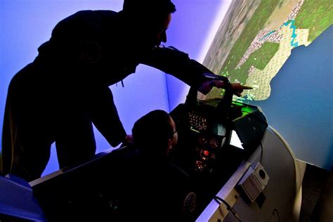 U.S. Air Force Capt. Arnold Lucchesi instructs 9-year-old