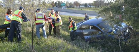 Emergency crews removed wrecked vehicle after an accident along northbound U.S. 31, just north of Muskegon, Mich., Tuesday, Sept. 6, 2016. A blown tire may have contributed to the crash that .... 