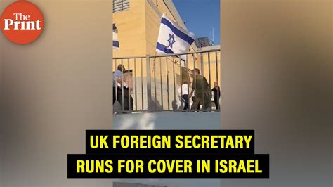 UK foreign secretary runs for cover as sirens go off in Israel