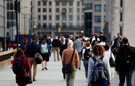 UK unemployment rate edges down unexpectedly as number in work hits record high