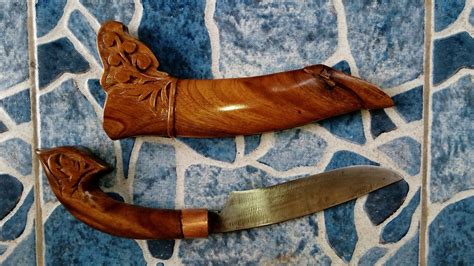 Ukiran Sarung Pisau Kayu - balustradellc