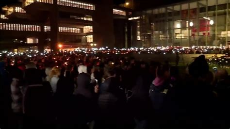 UMass Dartmouth honors two deceased students at somber candlelit vigil