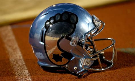 UNC football program to wear chrome helmets …