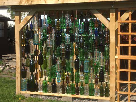 Upcycle wine bottles into a wall - Blogger - raincitystudios.com