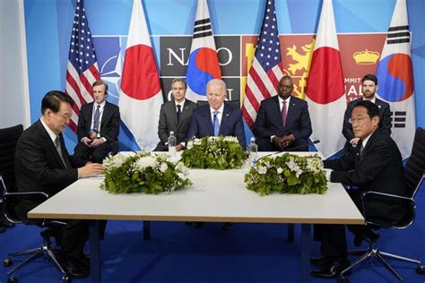 US, Japan and South Korea open summit to bolster security over objections of Beijing
