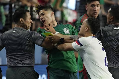 US 3-0 win over Mexico cut short by homophobic chants on night of 4 red cards