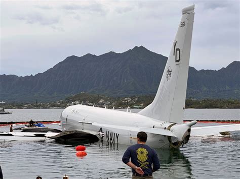 US Navy plane removed from Hawaii bay after it overshot runway. Coral damage remains to be seen