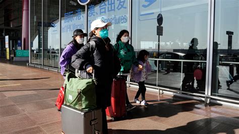 US officially rescinds recent Covid testing rules for travelers from China