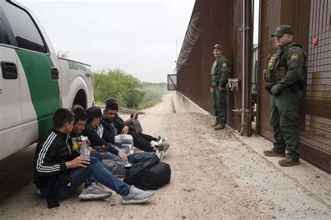 US troops arrive at border as migration curbs set to end