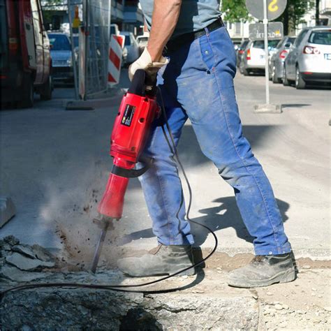 Using a rotary hammer to break up concrete - balustradellc