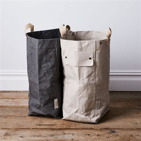 Uashmama. A necessity for any home to stay organized, our Legna is a portable, lightweight, home storage tote. Sustainably made from our washable paper, it easily collapses and folds for compact storage. 