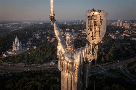 Ukraine replaces Soviet coat of arms with trident on towering Kyiv landmark