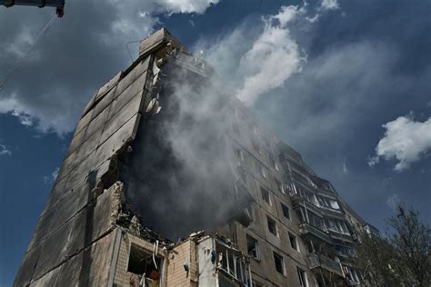 Ukraine says Russian missiles hit another apartment building and likely trapped people under rubble