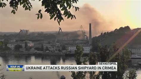 Ukrainian attack damages 2 ships, injures 24 people and sets port on fire in Russia-annexed Crimea