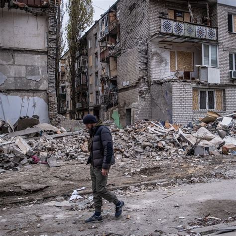 Ukrainian officials say Russian shelling has hit a southern city, killing 2 people in the street