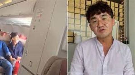 Un pasajero surcoreano intenta abrir la puerta de un avión en pleno vuelo