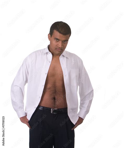 Unbuttoned shirt. A few friends of mine dress well (imo) using light colored dress shirts that are unbuttoned at the top and rolled up at the sleeves. 