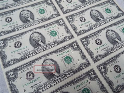 1995 uncut 2 dollar bills signed in person by the treasurer. Very uniq