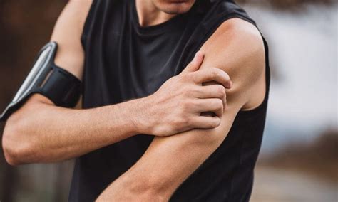 th?q=Understanding Post-Workout Arm Pain: Causes and Solutions
