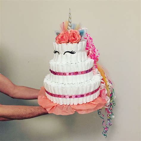 Unicorn diaper cake. Check out our rainbow diaper cake for baby girl selection for the very best in unique or custom, handmade pieces from our party & gifting shops. 