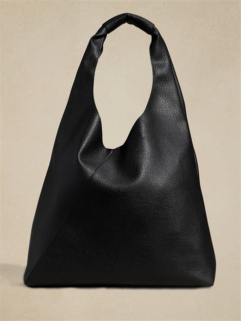 Universal hero meaning.  Simplify setup and enjoy convenience.  This mini slouchy bag feat...
