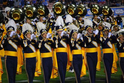 University band. Performances by the marching band feature fast-paced, high-energy, pop music including Billy Joel, Carlos Santana, Bill Chase, Stevie Wonder and Gloria Estefan/ ... 