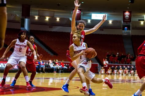 HOUSTON – Despite double-digit scoring from five different Cougars, the University of Houston women's basketball team fell in double overtime 91-88 at Rice on Saturday in Tudor Fieldhouse. Houston (2-8) led by 10 points at halftime, posted a season-high 14 assists and received six-or-more points from seven different scorers but ultimately ....