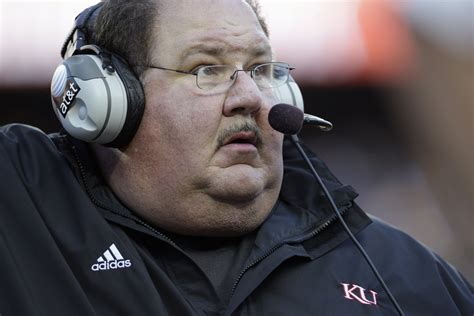 University of kansas football coaches. Mark Thomas Mangino (born August 26, 1956) is a former American football coach. He served as the head football coach at the University of Kansas from 2002 to 2009. In 2007, Mangino received several national coach of the year honors after leading the Jayhawks to their only 12-win season in school history and an Orange Bowl victory. 