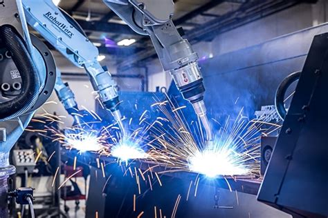 Unlock Efficiency and Precision with Industrial Welding Robots