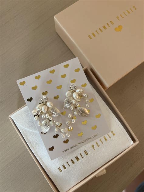 Untamed petals. Daisy Studs. $48.00. Availability: Ready to Ship. Color: Gold. Add to cart. Pay in 4 interest-free installments for orders over $50.00 with. Learn more. Complete the look. 