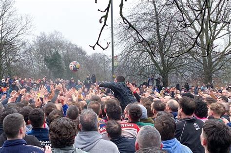 Up the Up ards down the Down ards! The Royal Shrovetide Football Game â€“ in  pictures
