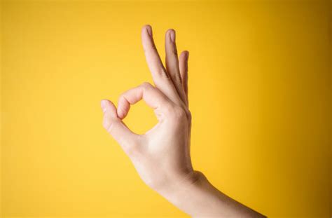 The love-you gesture or I love you hand sign emoji is the American Sign Language gesture for "I love you," showing a hand with a raised index finger and pinky (little) finger and an extended thumb. It comes in a range of skin tones. It's used to express affection … but is also used when people are trying to find the sign of the horns ...