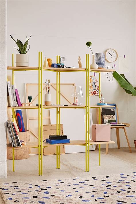 Shop Ryan Wall Shelf at Urban Outfitters today. Discover more selections just like this online or in-store. ... - One-of-a-kind, each shelf has natural wood variance . Content + Care - Brackets sold separately - 100% Pine wood - Wipe clean - Imported . Size Medium - Dimensions: 12"l x 8"w x 0.75"h - Weight limit: 6.6 lbs - Weight: 1.3 lbs