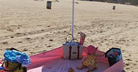 Use a Fitted Sheet to keep the sand out at the Beach...great idea