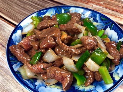 Use an electric cooker to make "Black Pepper and Scallion Stir …