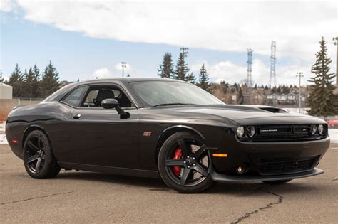 Used challenger srt. When it comes to buying a used car, the price is often a top consideration. The Price of a used Dodge Challenger in UAE depends on the year, model, mileage, and overall condition of the car. As of 2023, the average price for a used Dodge Challenger in UAE ranges between AED 1924497 - 3439500AED. The price of a used Dodge Challenger … 