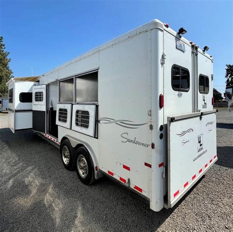 Used living quarter horse trailer. Has Living Quarters. 2019 4-Star Stock combo living quarters trailer features a 10’ straight wall living quarters with a fold down bunk and couch, one TV, recessed cooktop, microwave, refrigerator, shower, and commode. Includes 5’ mid tack with removable sadd... Used Horse Trailer2022 4 Star Trailer$89,900.00. 