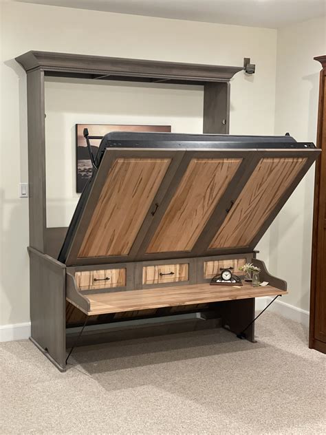 Used murphy beds. This client needed a solution to a very cramped bedroom that she also used as an office. A Murphy bed fit the bill here, and some Victorian features … 